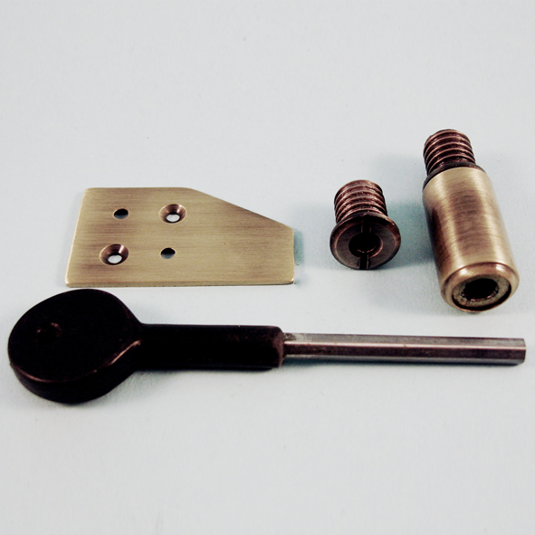 THD256/AB • 28mm • Antique Brass • Surface Sash Stop With Stainless Steel Insert and Extended Key